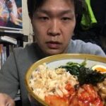 北岡悟丼を食べる
